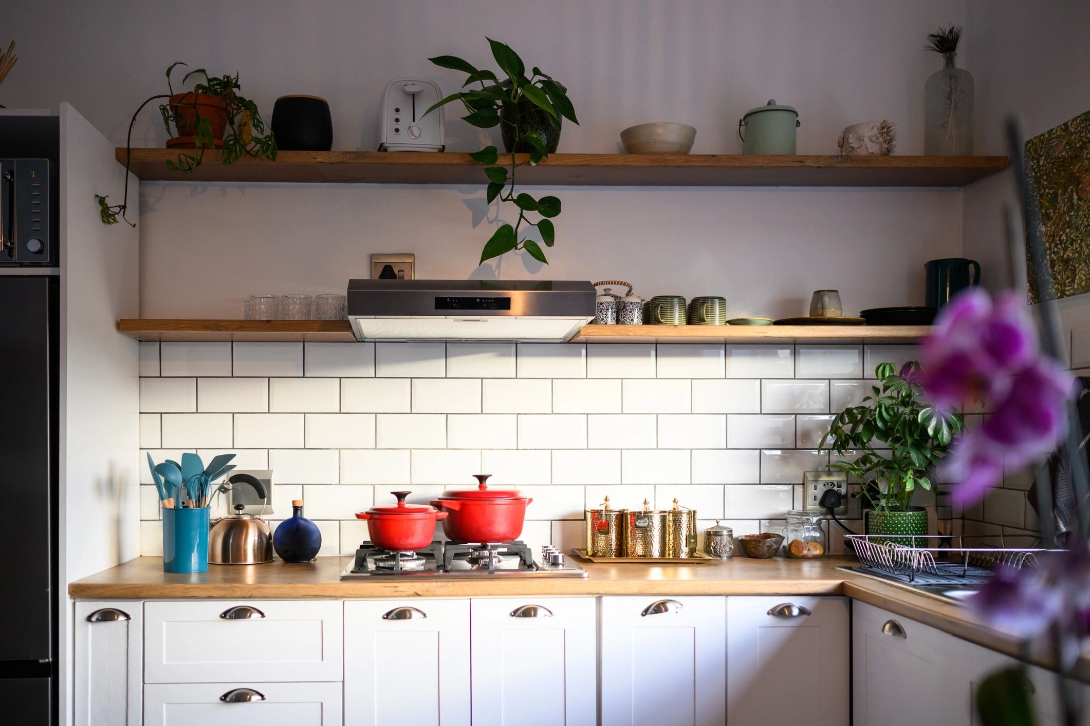 Bright modern kitchen with white cabinets and clean finishes